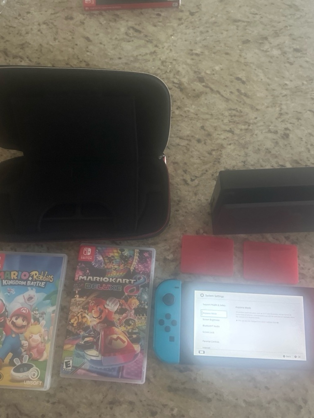 Nintendo Switch Console with Blue Joy‑Con, Dock and Games